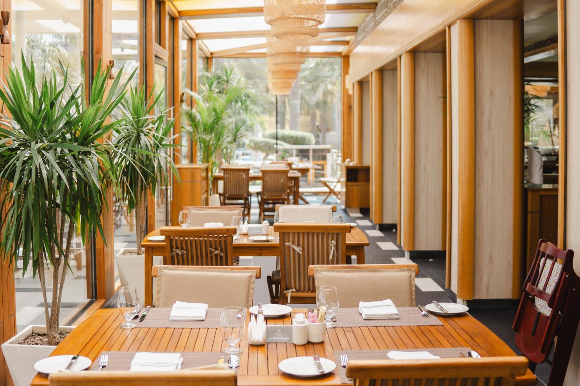 Palavra Resort Manama Exterior photo The restaurant