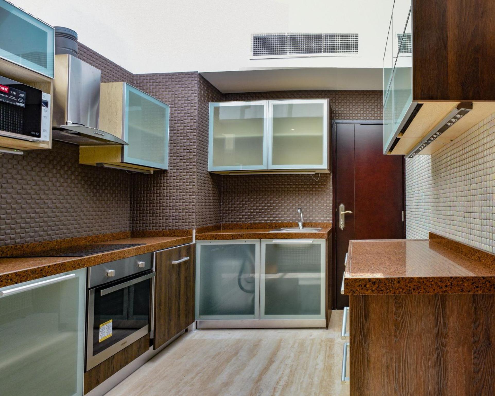Palavra Resort Manama Exterior photo A modern kitchen