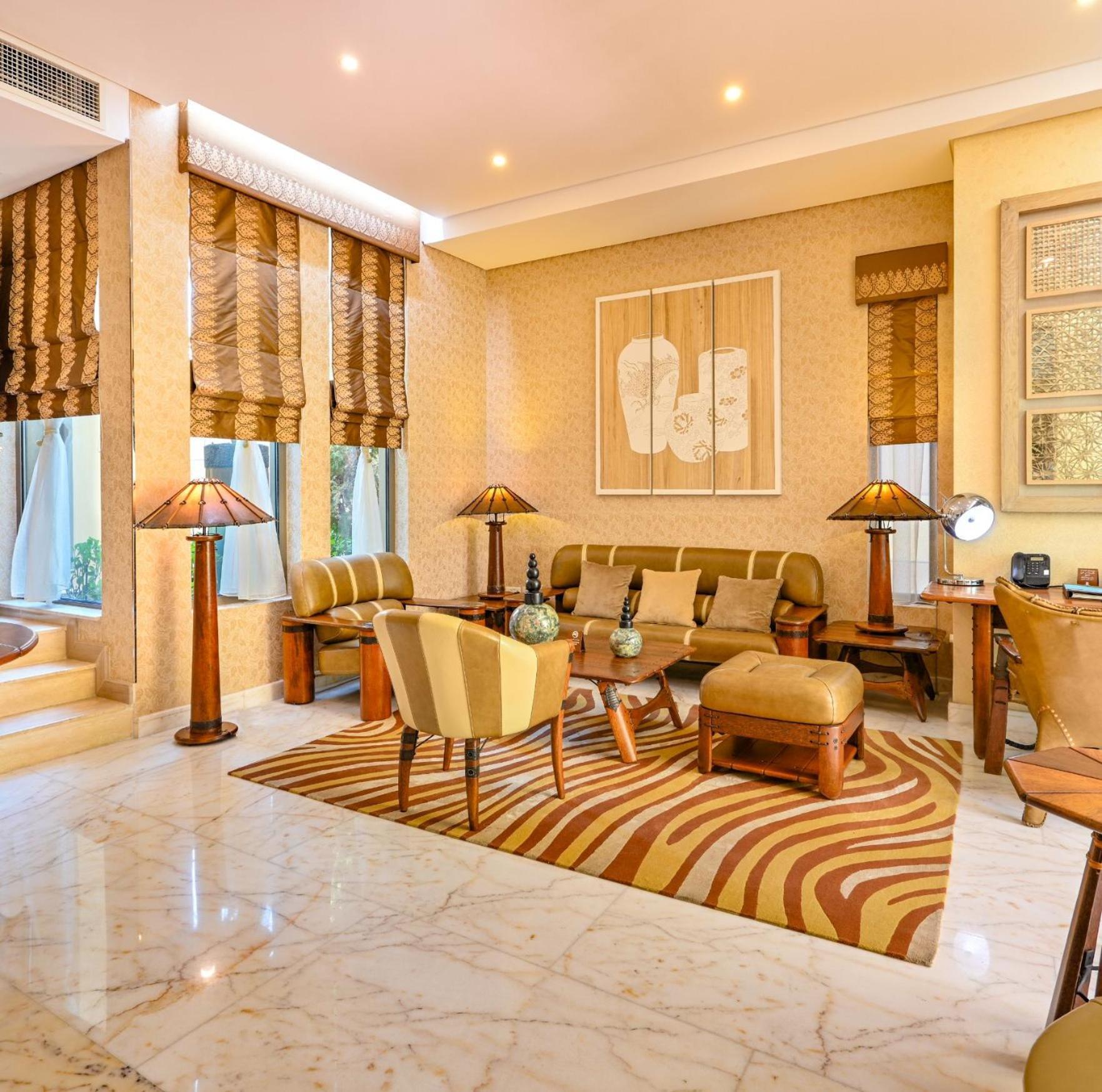 Palavra Resort Manama Exterior photo The interior of a suite at the Taj Mahal Palace, Mumbai