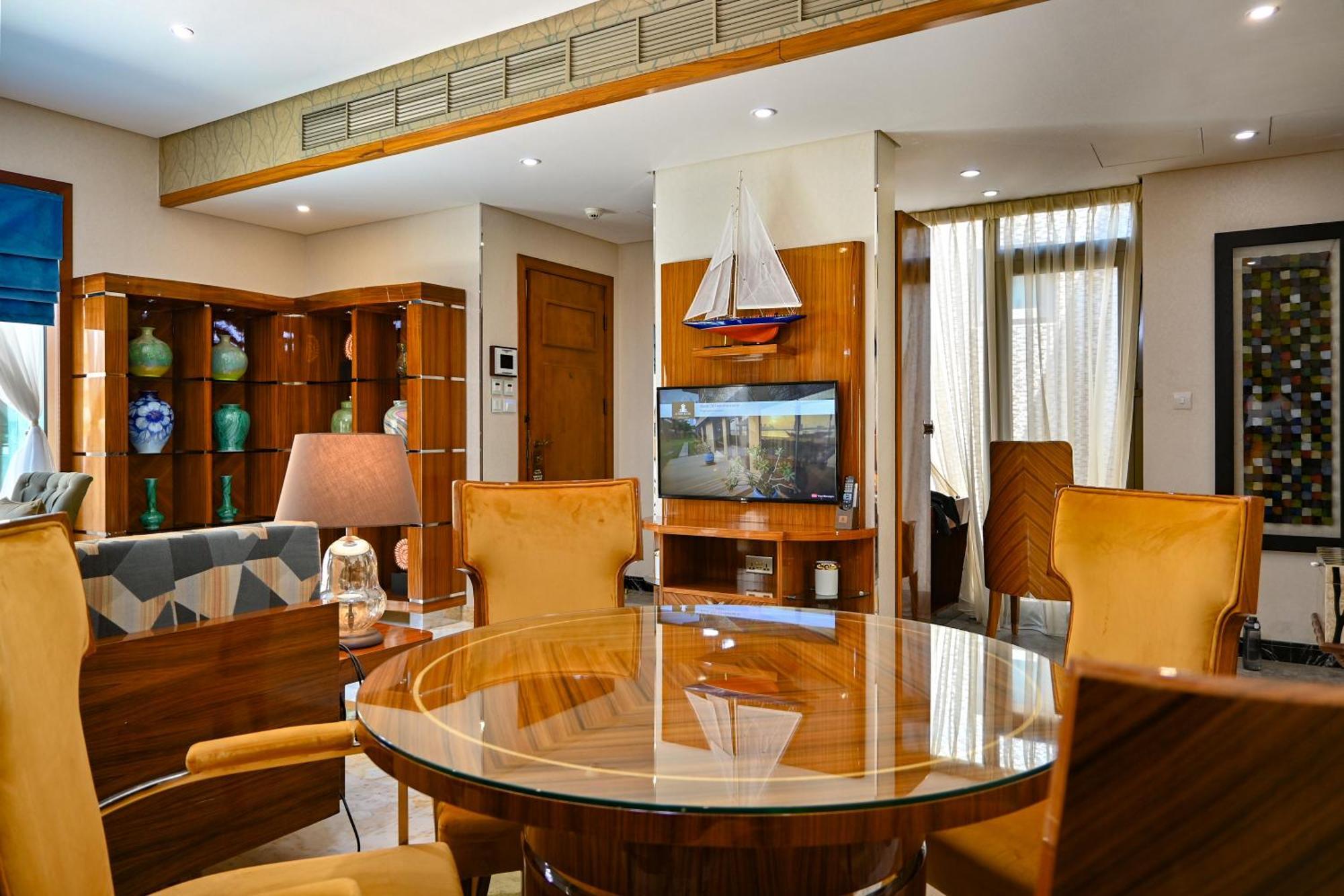 Palavra Resort Manama Exterior photo A dining room in a house in India
