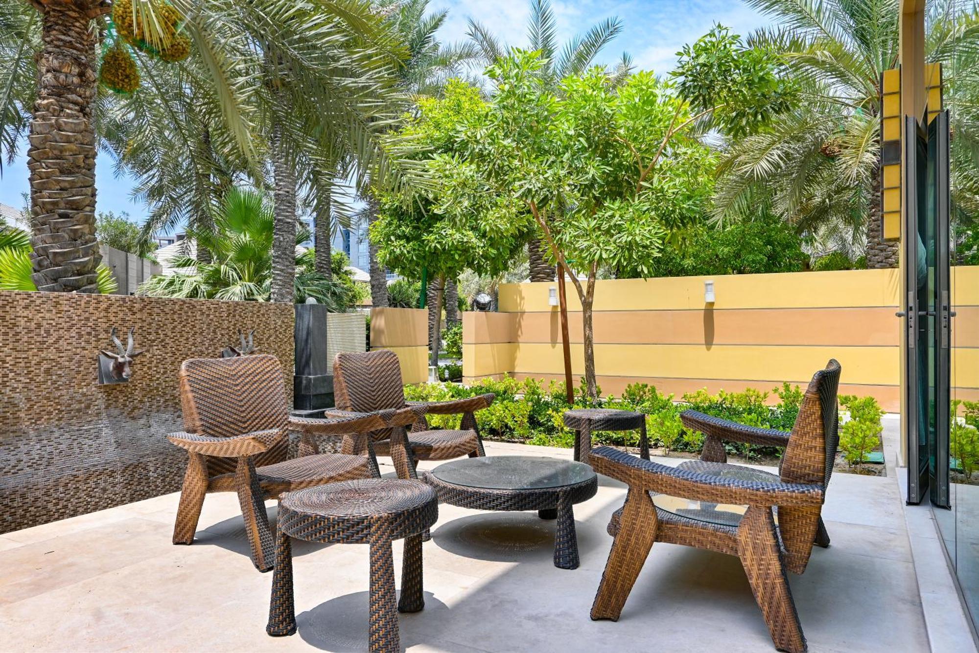 Palavra Resort Manama Exterior photo The Palm Beach Hotel