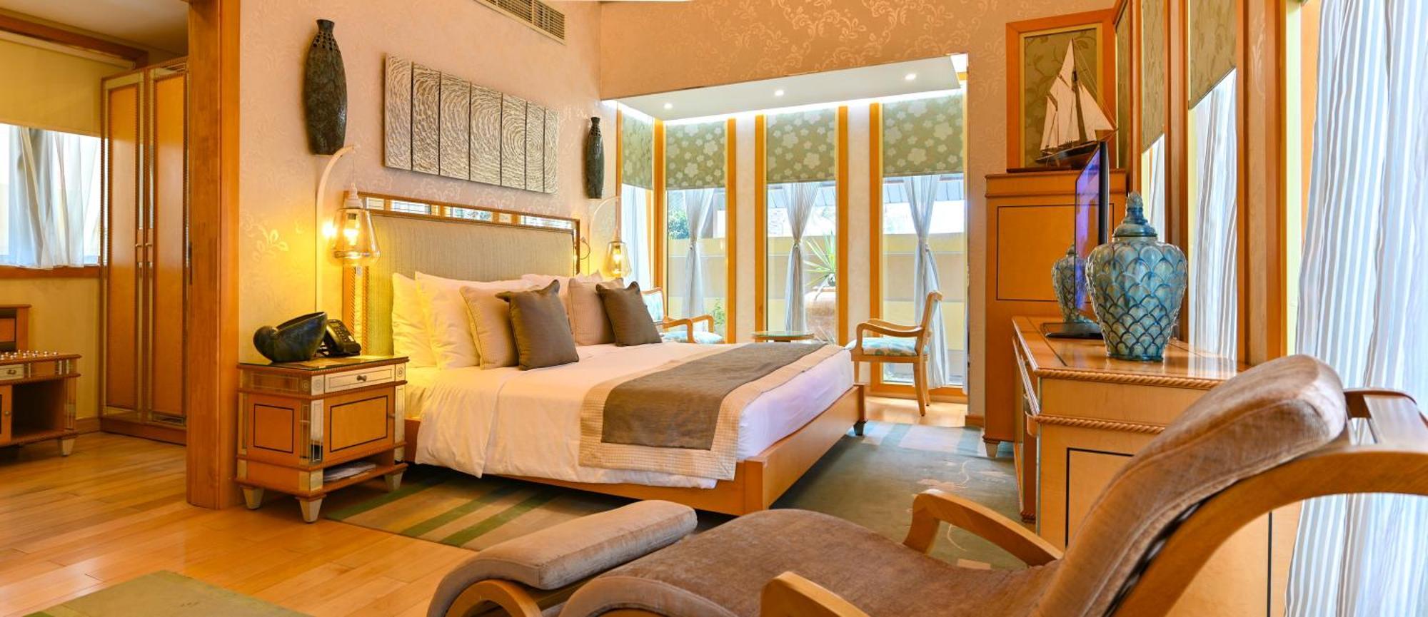 Palavra Resort Manama Exterior photo A bedroom at the Taj Bengal